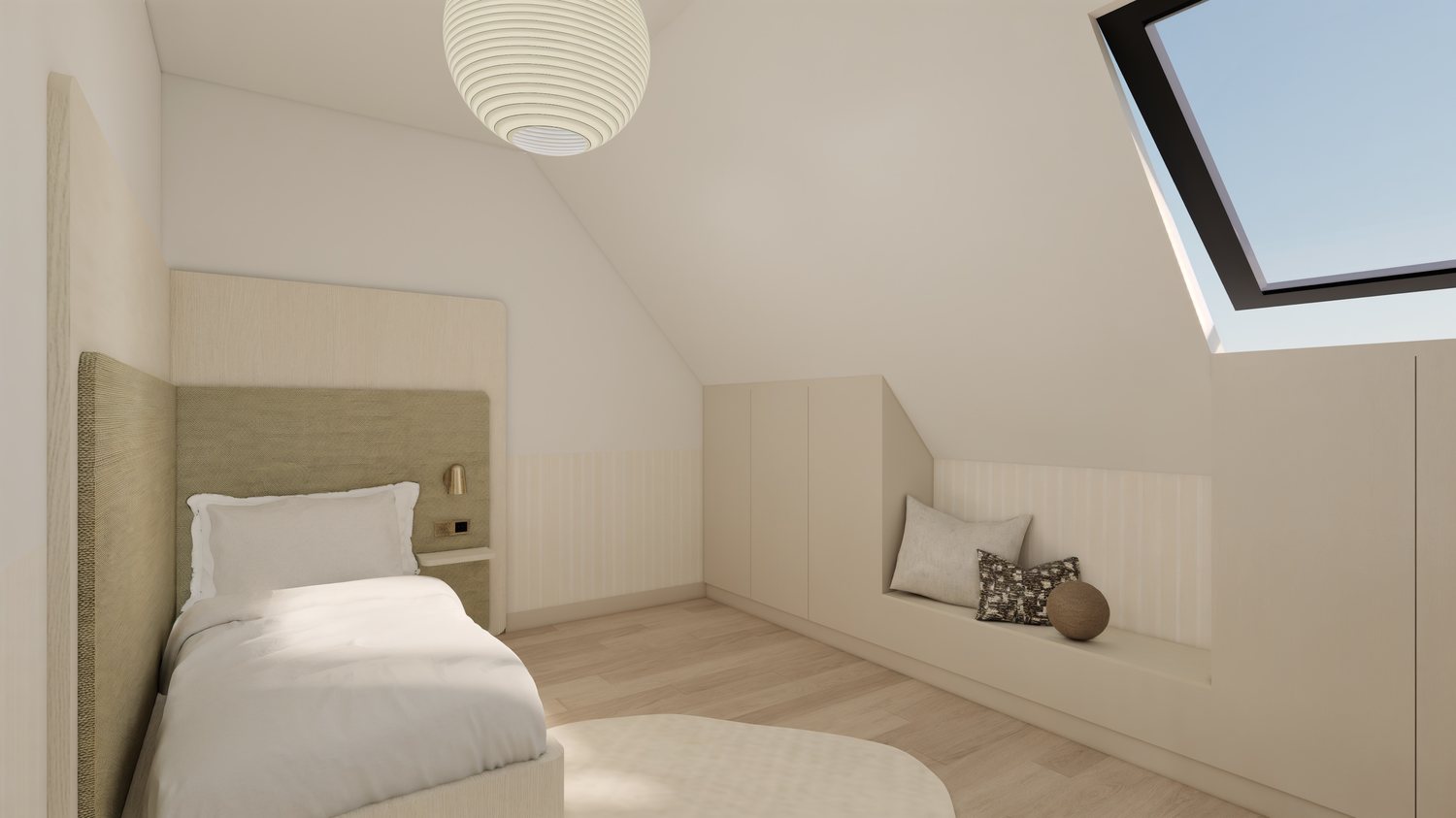 Chambre sous combles — lit et banquette